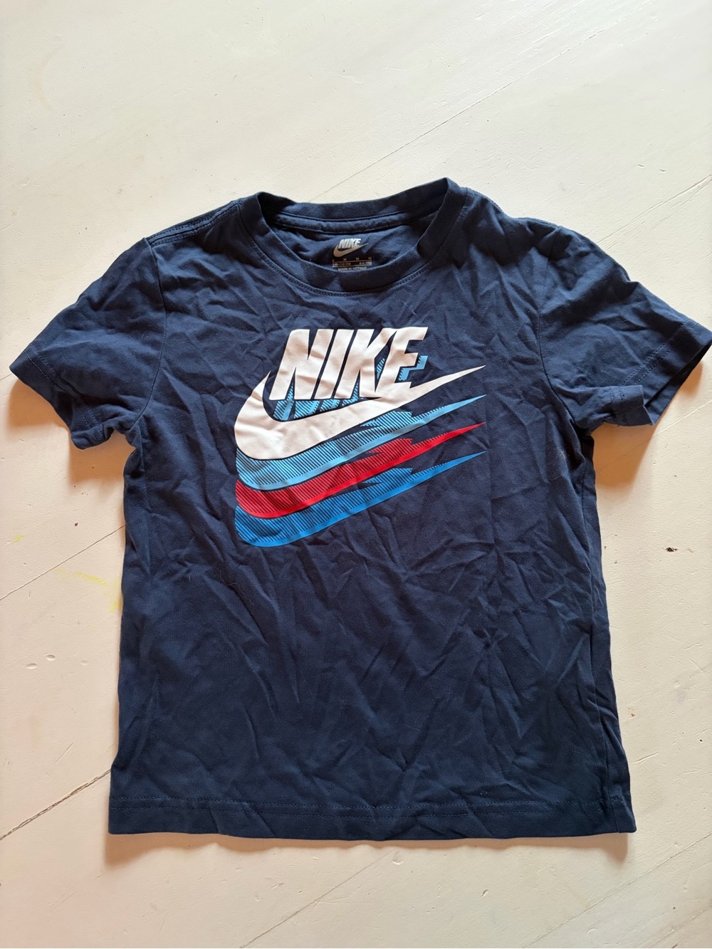 Kids Nike Navy Tee with White, Red & Light Blue Swoosh